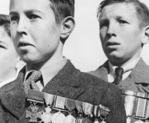 Boys With Fathers War Medals