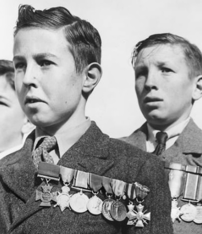 Boys With Fathers War Medals
